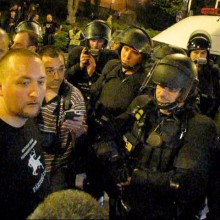 Riot police prepare to arrest Tomcat for leading an unauthorized demonstration (4/11/2008).