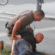Plain-clothes cop arrests anti-gay demonstrator at the Budapest Pride parade (7/5/2008).