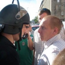 Confrontation between cop and anti-gay demonstrator during the annual Budapest Pride parade (7/7/2007).